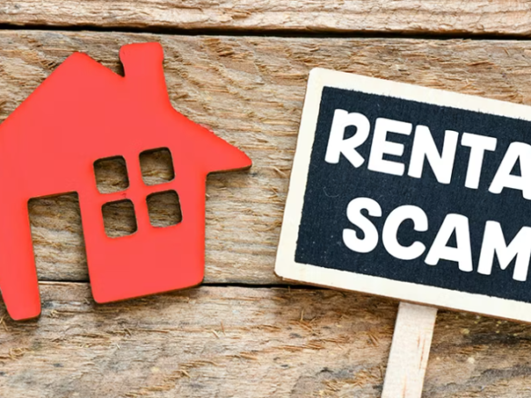 Red house icon with a sign that says “Rental Scam” representing rental fraud in the real estate market