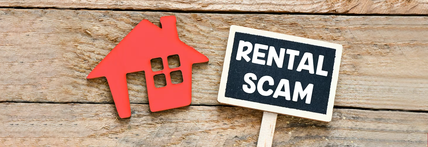 Red house icon with a sign that says “Rental Scam” representing rental fraud in the real estate market